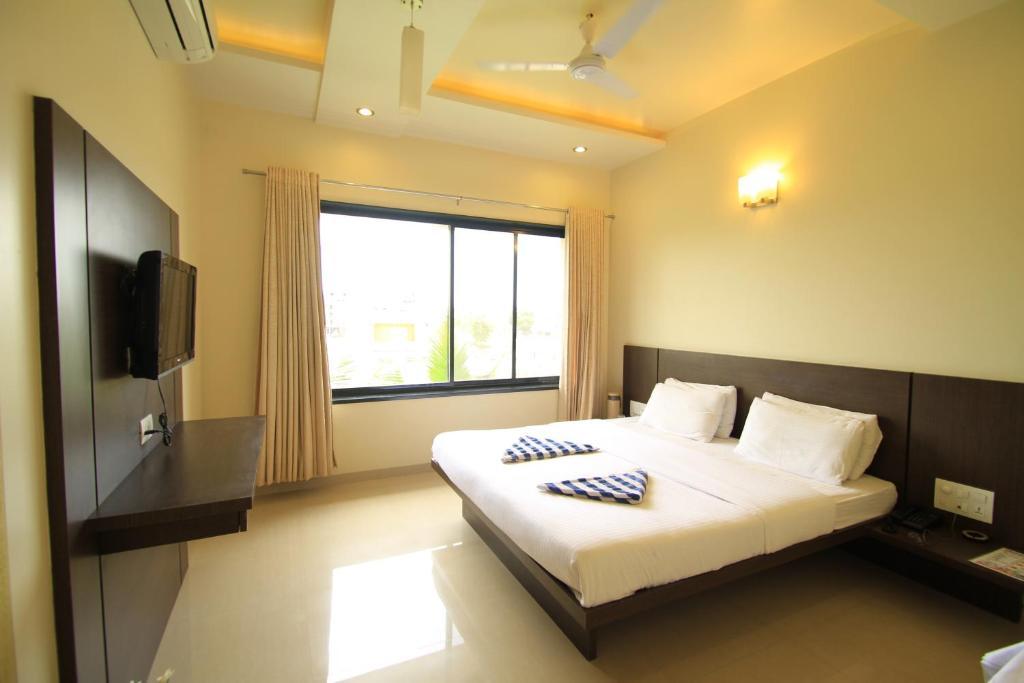 Hotel Sai Smaran Shirdi Habitación foto