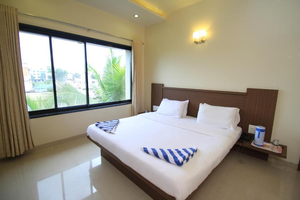 Hotel Sai Smaran Shirdi Habitación foto