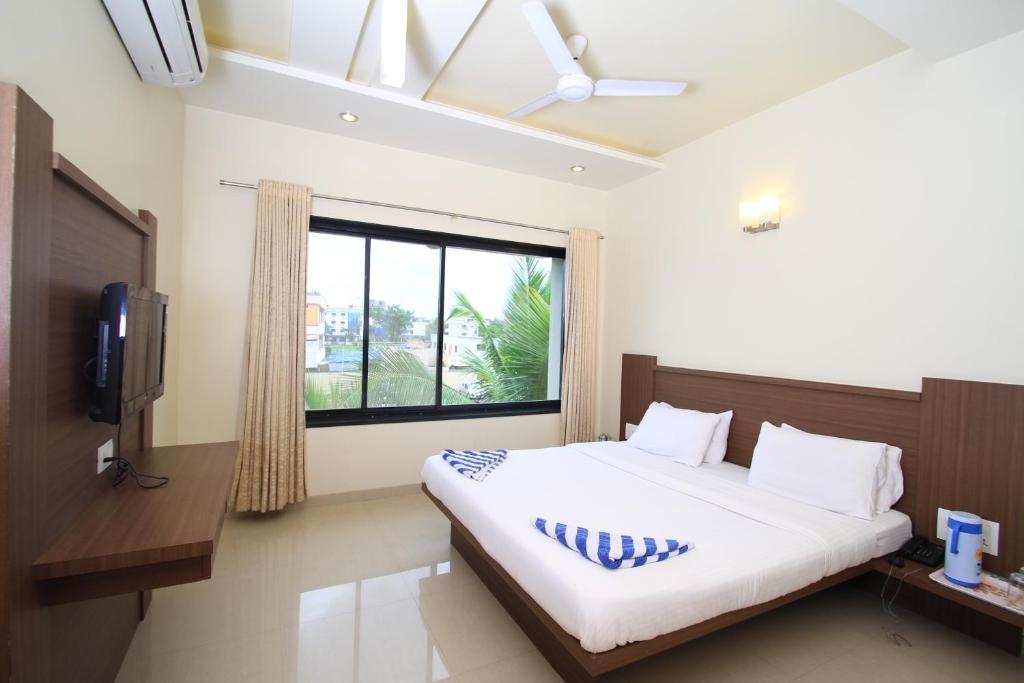 Hotel Sai Smaran Shirdi Habitación foto
