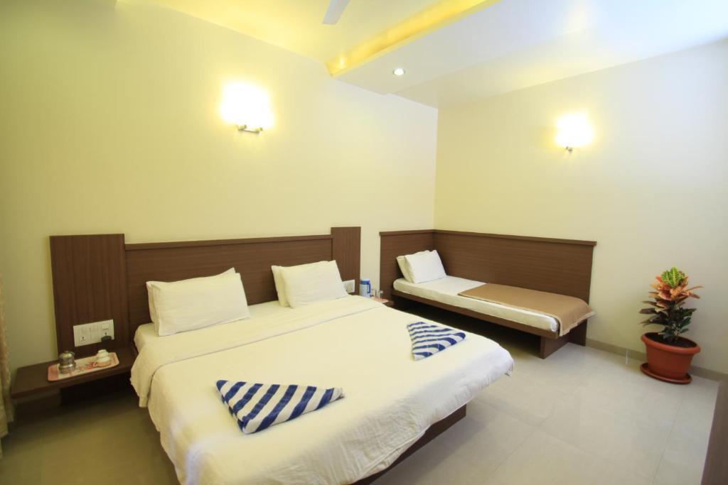 Hotel Sai Smaran Shirdi Habitación foto