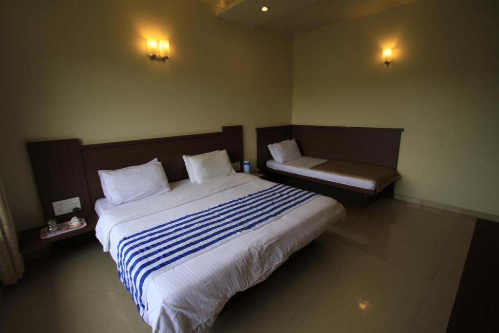 Hotel Sai Smaran Shirdi Habitación foto
