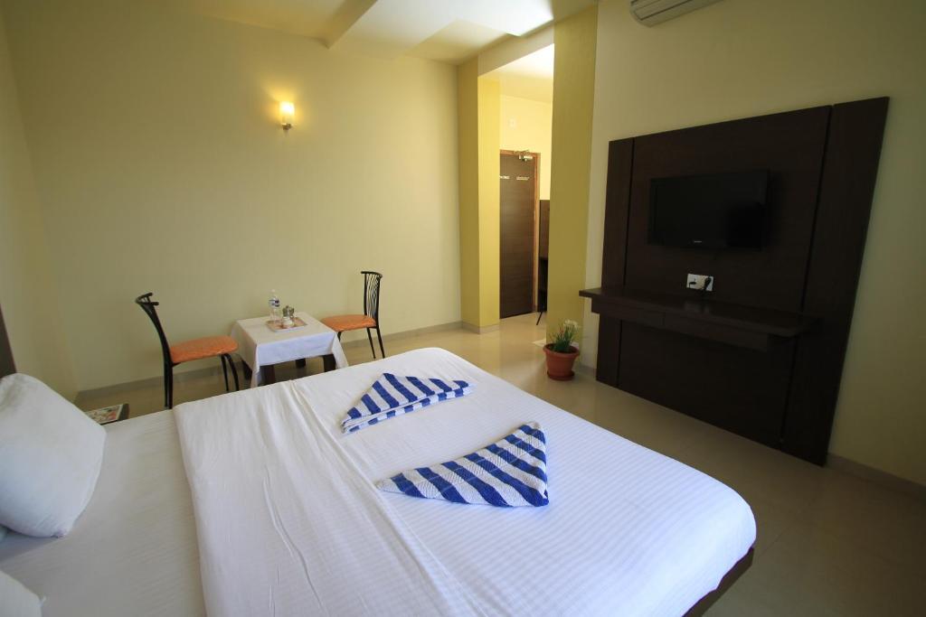 Hotel Sai Smaran Shirdi Habitación foto