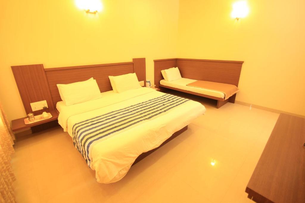 Hotel Sai Smaran Shirdi Habitación foto