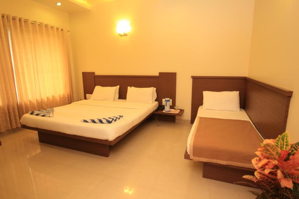 Hotel Sai Smaran Shirdi Habitación foto